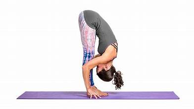 4. Uttanasana (Standing Forward Bend)